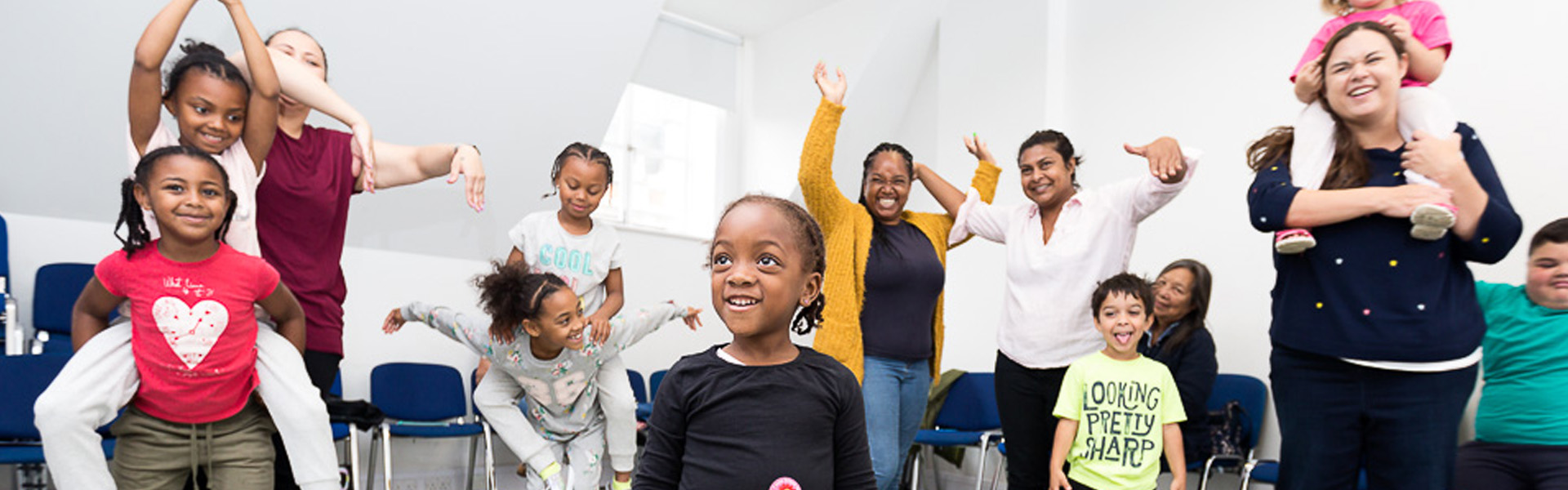A group of families taking part in a workshop