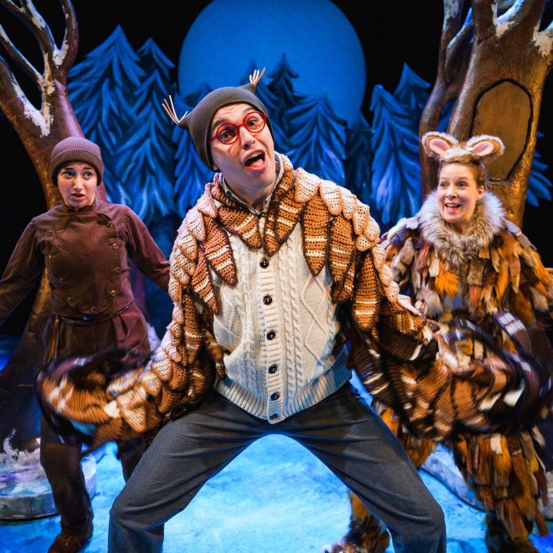 three people dressed as a mouse, an owl and the gruffsalos child looking happy